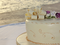 The wedding cake set up near the Sea